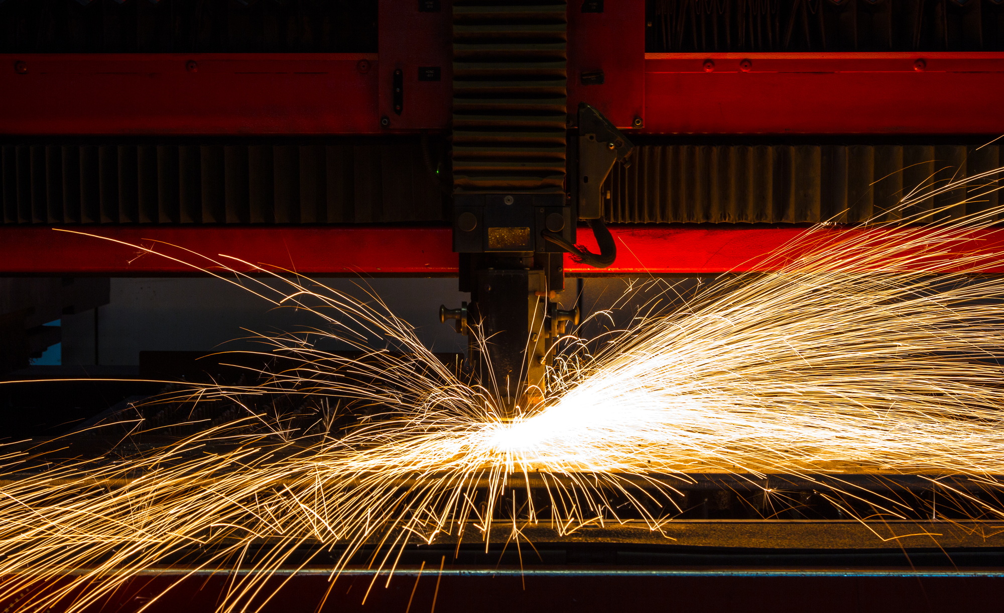 Laser machine cutting of sheet metal.